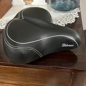 Extra wide universal stationary bicycle seat